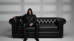 Tailored black leather jacket with quilted shoulders